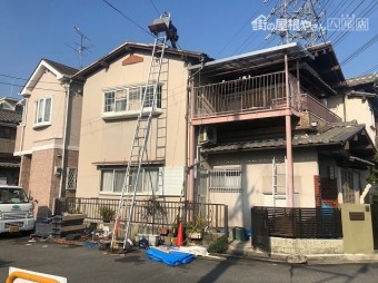 はしごで荷上げ